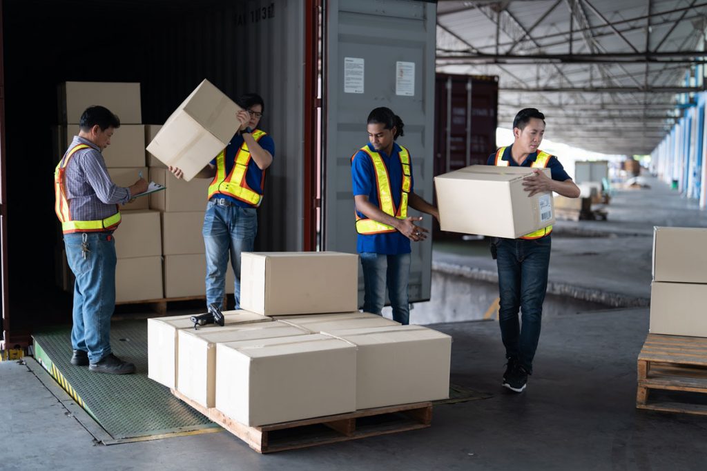 workers-open-steel-40-feet-container